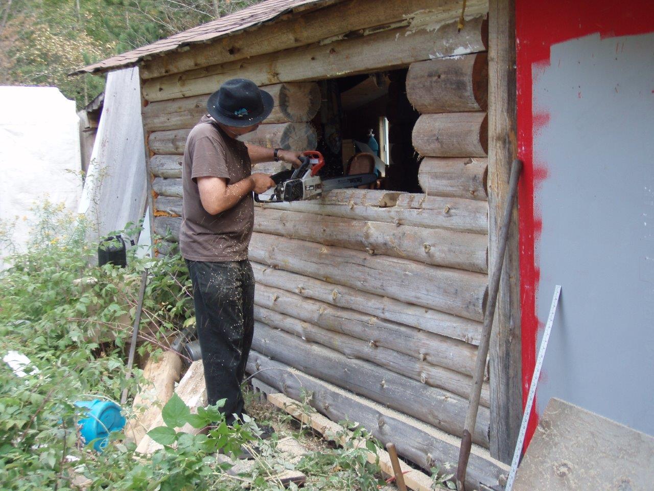 Bill Frey Cutting New Window in Log Cabin (5)