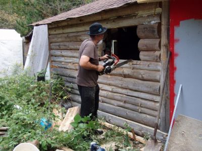 Bill Frey Cutting New Window in Log Cabin (2)